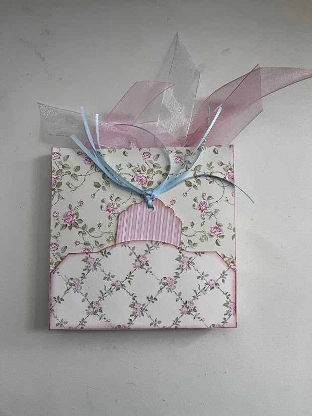 Back view of finished Le’ Gated Garden flip-out folio tied with pastel ribbons, handmade junk journal gift idea.