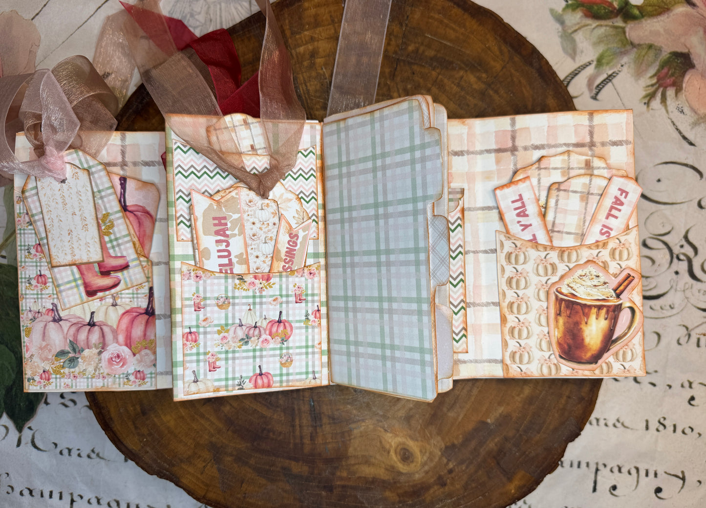Interactive fall folio with plaid pages, seasonal journaling cards, pockets, and ribbon tags
