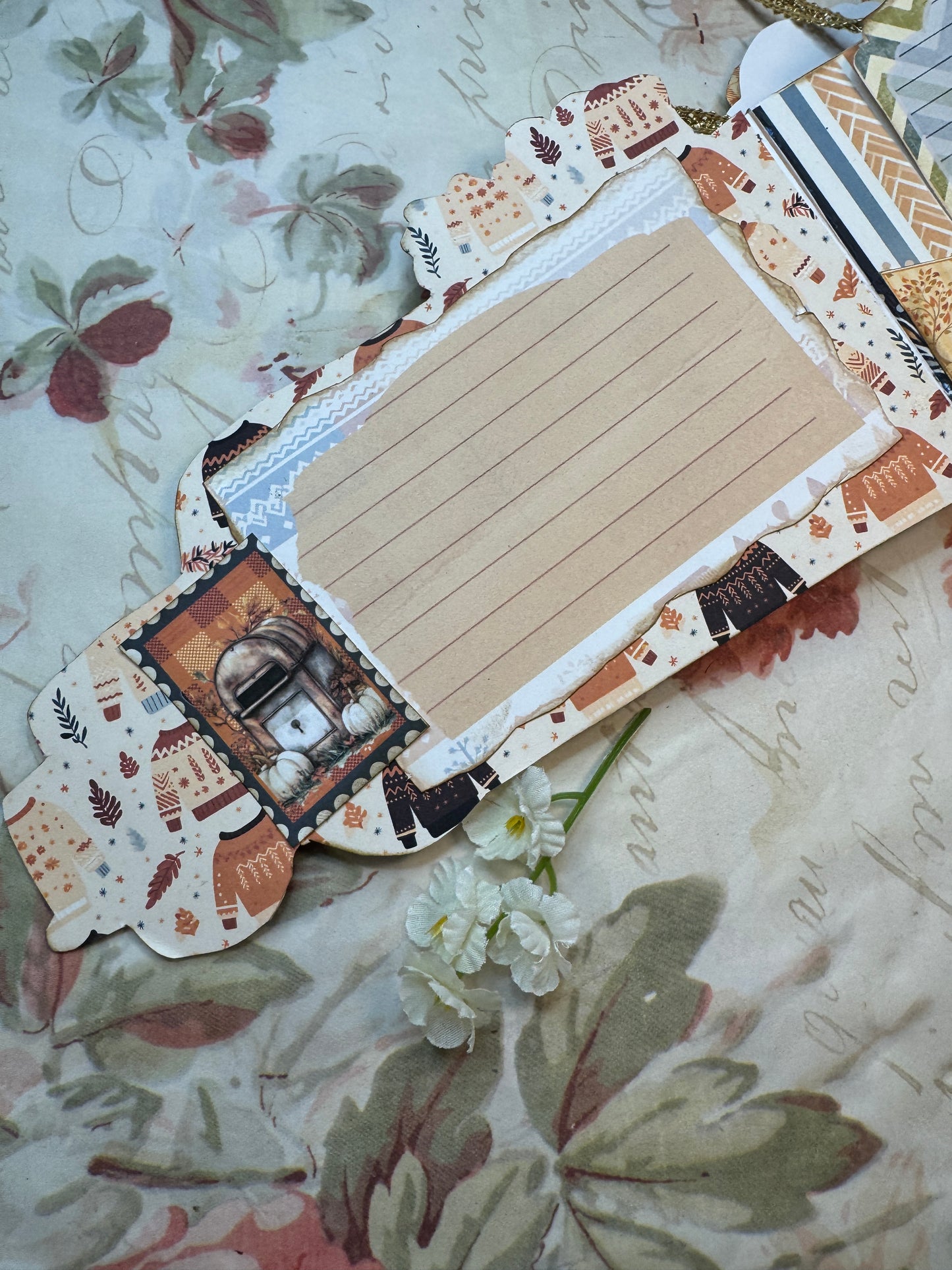 Decorative paper tag with intricate patterns on a floral background