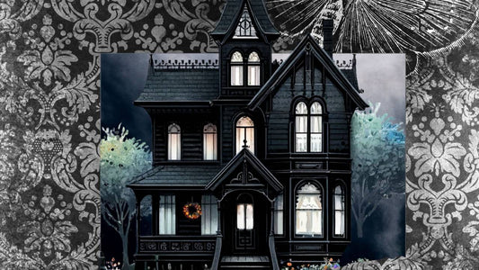 Twilight Manor Memory Keeper Journal with spooky Victorian house cover, black and white moth embellishment, and assorted black and white ribbons.