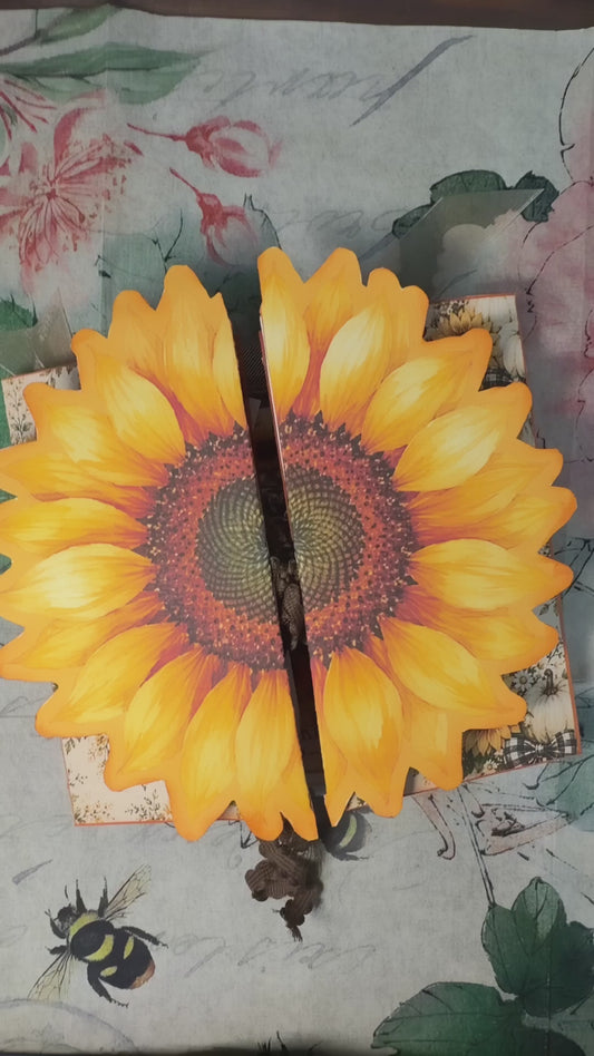 Short flip-through of the Sunflower Harvest Junk Journal Folio showing the dimensional sunflower cover and interactive interior pages with sunflower artwork, buffalo plaid, pockets, tags, journaling spaces, farmhouse ephemera, and harvest-themed fold-outs.