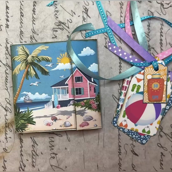 Life’s a Beach printable memory keeper folio kit featuring a pink beach house, palm trees, summer tags, bookmarks, and tropical ephemera for junk journaling and paper crafts