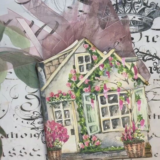 Video tutorial for Lil’ Cottage Memory Keeper folio kit showing how to assemble a beach-themed junk journal with printable tags, ephemera, and summer embellishments