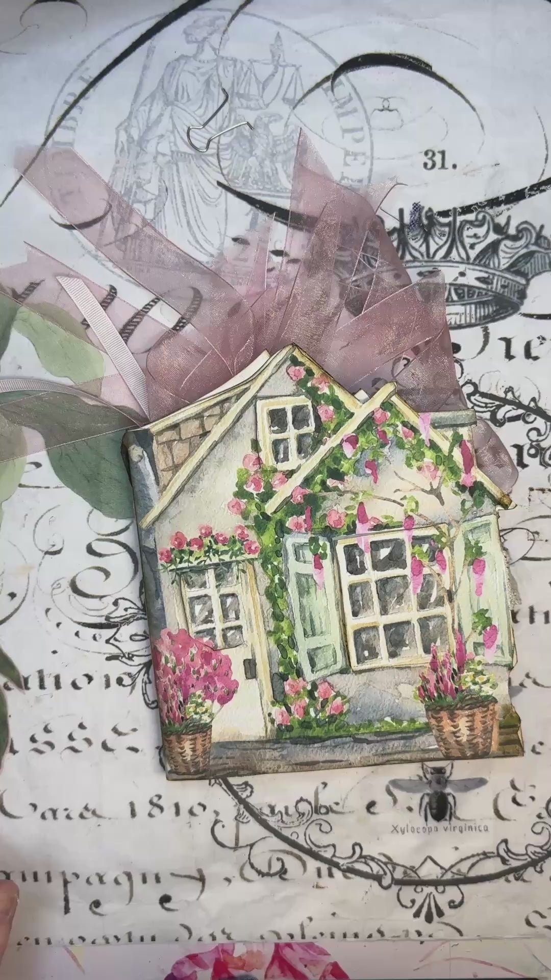 Video tutorial for Lil’ Cottage Memory Keeper folio kit showing how to assemble a beach-themed junk journal with printable tags, ephemera, and summer embellishments