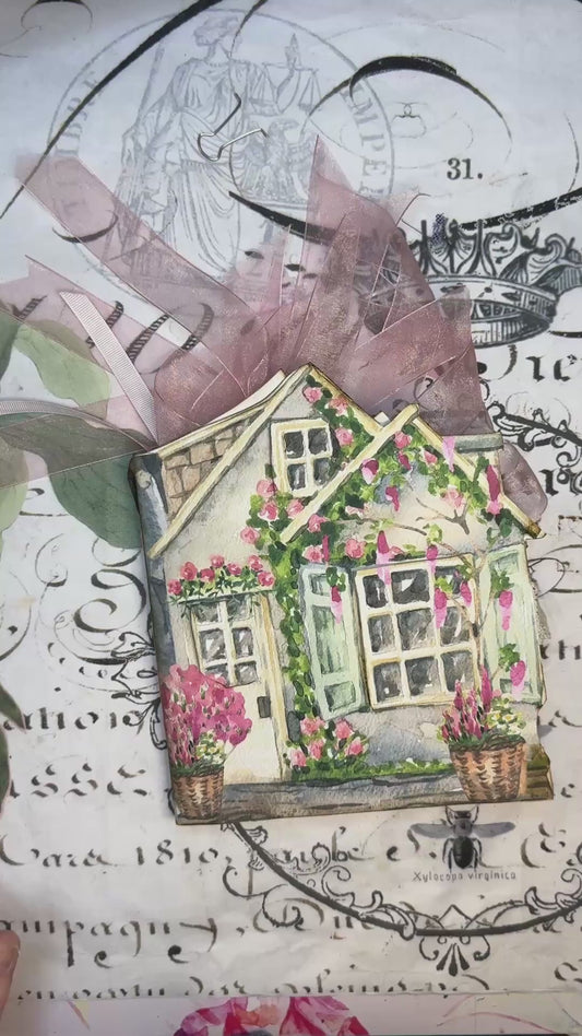 Video tutorial for Lil’ Cottage Memory Keeper folio kit showing how to assemble a beach-themed junk journal with printable tags, ephemera, and summer embellishments